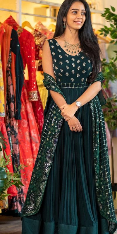 Persian Green Gown Style Salwar Kameez has Contrast colored Floral  embroidered neckline & front of Level … | Colorful dresses, Indian gowns  dresses, Party wear gown