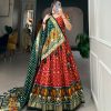 Glamorous Red Color Tussar Silk Drawstring & Printed With Foil Print & Heavy Tassels Lehenga Choli