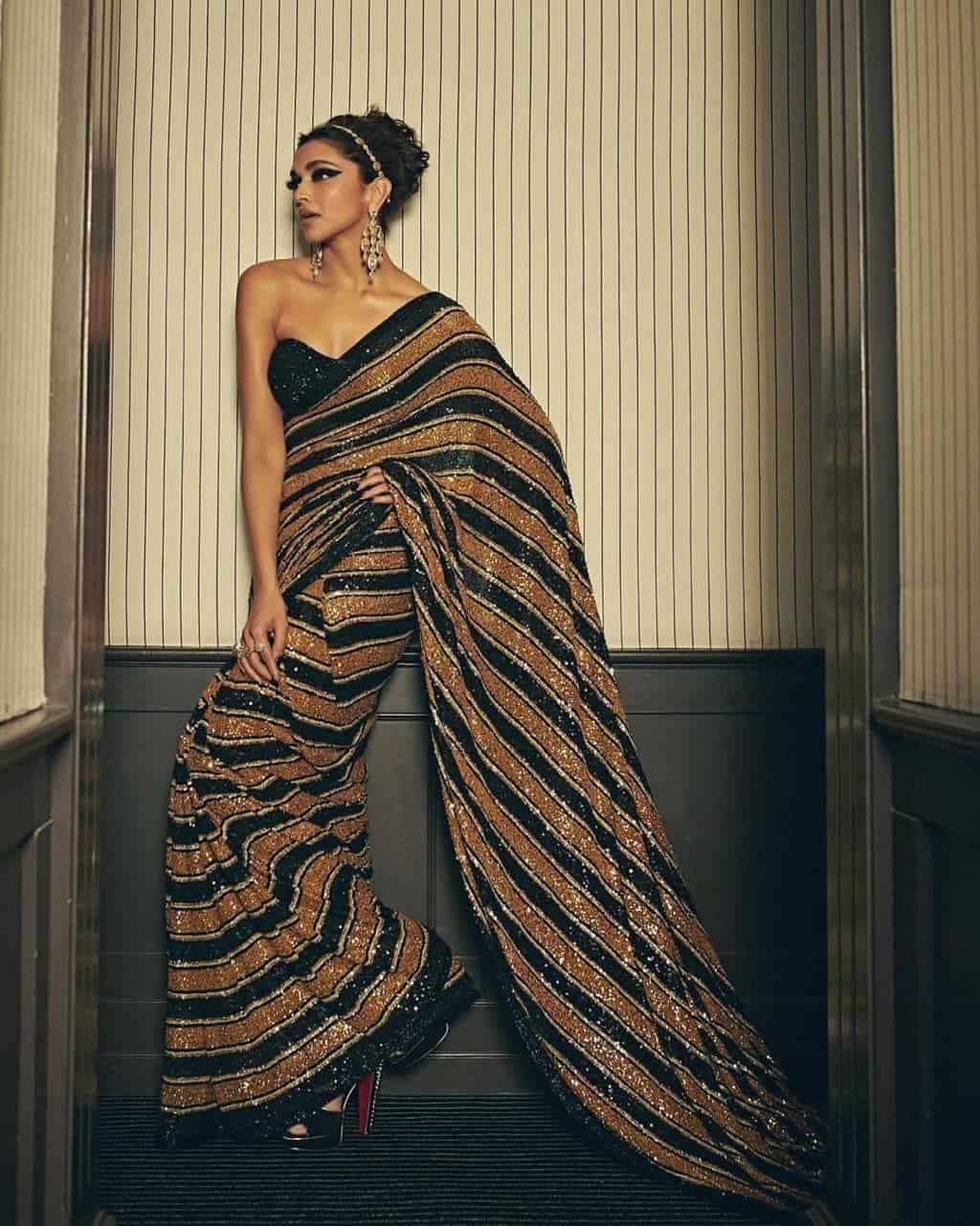 LG 1491 Gold & Black Saree : Heavy Faux Georgette Work : Fancy Double Sequence Work Party Wear, Wedding, Special Events @2249/- | Bollywood Sarees, Creative Sarees, Designer Sarees, Embroidered Sarees, Ethnic Saree, Modern Digital sarees, Party Wear Sarees, Sarees