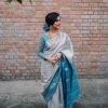 Aesthetically Pleasing Silver Color Soft Lichi Silk Butti Work Saree