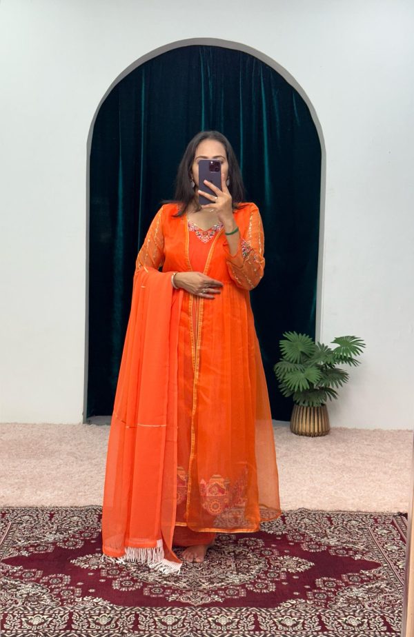 Superb Orange Color Chine Stitched Less Work Salwar Suit
