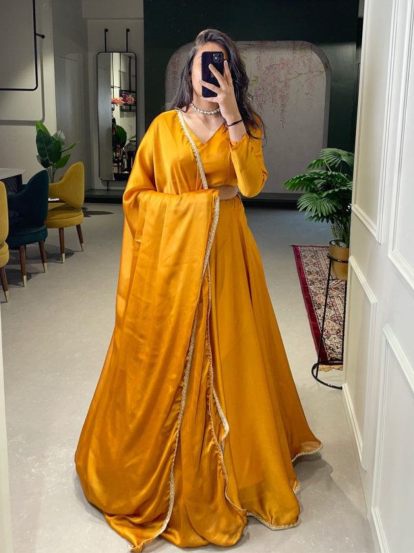Grand Mustard Color Rangoli Silk Plain Lace Border  Lehenga Choli