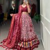 Aglow Maroon Color Tussar Silk Ikkat Print Foil Work Lehenga Choli