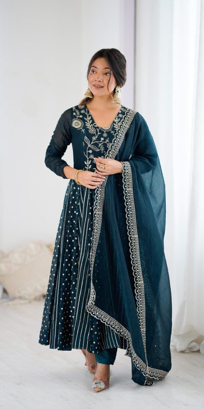 SRK 5293 Peacock Blue With Crunchy Silk With Fully Flair with Lace Work & Embroidery Work Anarkali Gown . Introductory Price ₹2149. Delivery 4-6 Worki | Bollywood Gowns, Creative Gowns, Designer Gowns, Embroidered Gowns, Gowns, Party Wear Gowns