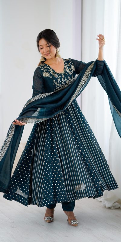 SRK 5293 Peacock Blue With Crunchy Silk With Fully Flair with Lace Work & Embroidery Work Anarkali Gown . Introductory Price ₹2149. Delivery 4-6 Worki | Bollywood Gowns, Creative Gowns, Designer Gowns, Embroidered Gowns, Gowns, Party Wear Gowns