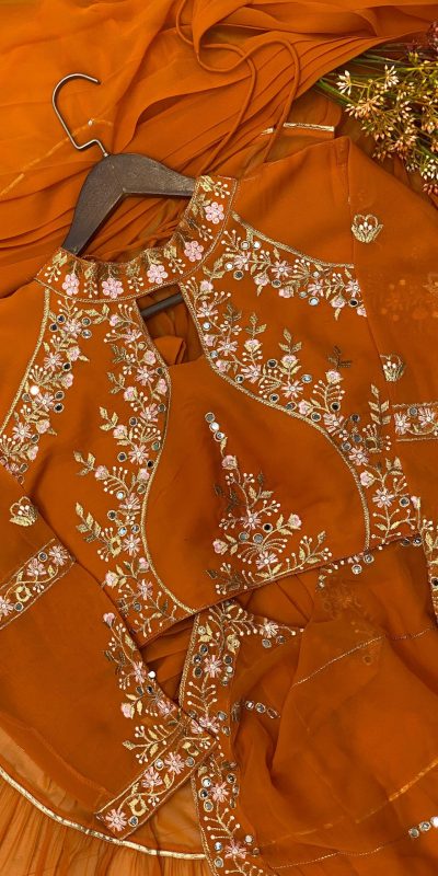 BE 280 Rust Georgette Lehenga Saree Perfect for Wedding, Party, Cultural Events, Housewarming, Ganesh Chaturthi . Affordable Price ₹2399. Delivery 4- | Creative Lehenga, Bollywood Lehenga, Designer Lehenga, Embroidered Lehenga, Lehenga, Party Wear Lehenga