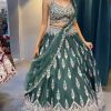 Green Fuax Georgette Cut Work Lehenga Choli
