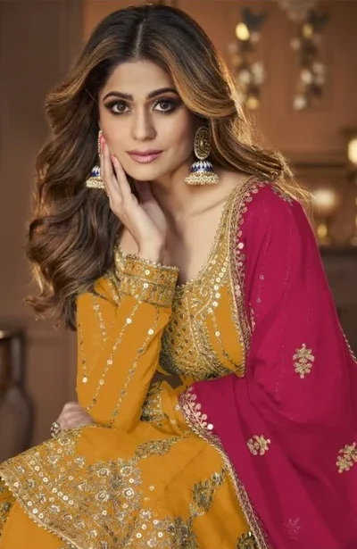 DS A 9125 Yellow Faux Georgette Salwar Suit with Embroidery Work. Special Price ₹2599. Delivery 4-6 Working Days. Shop now. | Casual Suits, Jump Suits, Tops & Bottoms, Track Suits, Trendy Wear, Creative suits, Designer Suits, Palazzo Suits, Party Wear Suits, Patiala Suits, Salwar suit, Straight Suits