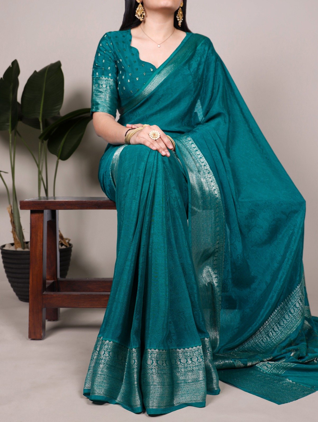 Teal Chinon Zari Weaving Work Saree