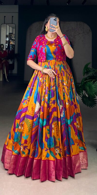 YNF 5035 Mustard in Taser Silk Zari Work & Kalamkari Print Gown . Available at ₹1799 only. Delivery 4-6 Working Days. Shop now. | Bollywood Gowns, Creative Gowns, Designer Gowns, Embroidered Gowns, Gowns, Party Wear Gowns