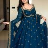 MF 1003 Peacock Blue Georgette Gown. Perfect for Wedding, Party, Pongal, Bridal Wear, Anniversary Price ₹1799. Delivery 4-6 Working Days. Shop now. | Bollywood Gowns, Creative Gowns, Designer Gowns, Embroidered Gowns, Gowns, Party Wear Gowns