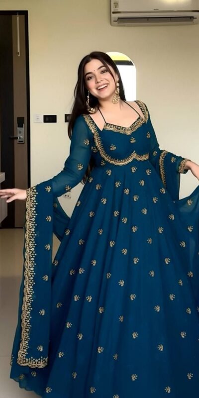 MF 1003 Peacock Blue Georgette Gown. Perfect for Wedding, Party, Pongal, Bridal Wear, Anniversary Price ₹1799. Delivery 4-6 Working Days. Shop now. | Bollywood Gowns, Creative Gowns, Designer Gowns, Embroidered Gowns, Gowns, Party Wear Gowns
