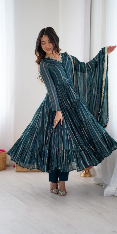SRK 5305 Peacock Blue Color Mal Chanderi Gown with Mirror Work & Lace Work. Grab it for ₹2399. Delivery 4-6 Working Days. Shop now. | Bollywood Gowns, Creative Gowns, Designer Gowns, Embroidered Gowns, Gowns, Party Wear Gowns