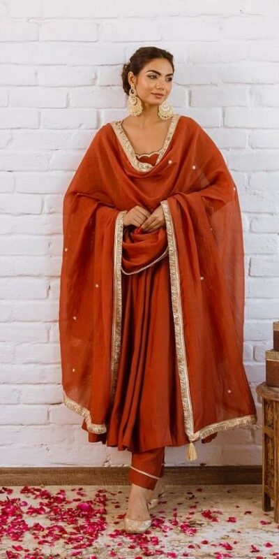 SRk 5324 Rust Color Vichitra silk Gown with Bead Work & Lace Work. Now at just ₹1849. Delivery 4-6 Working Days. Shop now. | Bollywood Gowns, Creative Gowns, Designer Gowns, Embroidered Gowns, Gowns, Party Wear Gowns