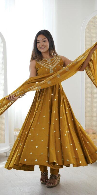 JF 038 Mustered Roman Silk Gown with Embroidery Work. Wedding, Party, Festive, Events, Navratri, Exclusive Offer ₹2149. Delivery 4-6 Working Days. Shop now. | Bollywood Gowns, Creative Gowns, Designer Gowns, Embroidered Gowns, Gowns, Party Wear Gowns