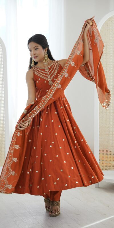 JF 038 Rust Roman Silk Gown with Embroidery Work. Wedding, Party, Festive, Events, Navratri, Exclusive Offer ₹2149. Delivery 4-6 Working Days. Shop now. | Bollywood Gowns, Creative Gowns, Designer Gowns, Embroidered Gowns, Gowns, Party Wear Gowns