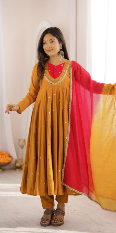 ZF 5023 Mustered Roman Silk Gown with Mirror Work & Embroidery Work. Special Price ₹2099. Delivery 4-6 Working Days. Shop now. | Bollywood Gowns, Creative Gowns, Designer Gowns, Embroidered Gowns, Gowns, Party Wear Gowns