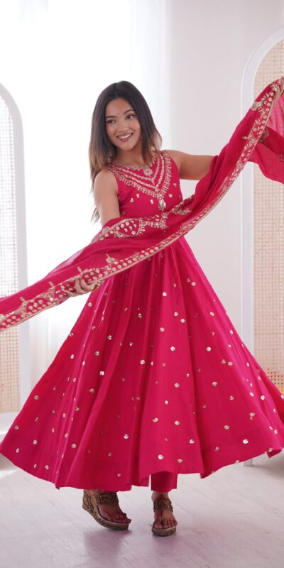 JF 038 Rani Pink Roman Silk Gown with Embroidery Work. Wedding, Party, Events, Navratri, Exclusive Offer ₹2149. Delivery 4-6 Working Days. Shop now. | Bollywood Gowns, Creative Gowns, Designer Gowns, Embroidered Gowns, Gowns, Party Wear Gowns