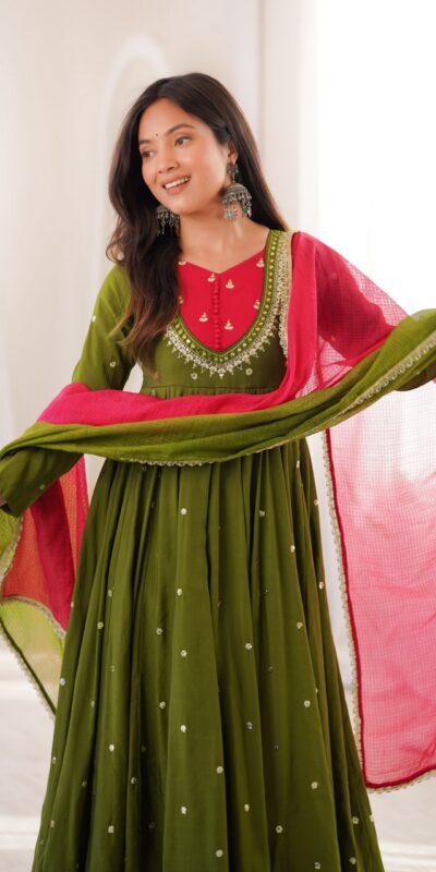 ZF 5023 Mehandi Roman Silk Gown with Mirror Work & Embroidery Work. Special Price ₹2099. Delivery 4-6 Working Days. Shop now. | Bollywood Gowns, Creative Gowns, Designer Gowns, Embroidered Gowns, Gowns, Party Wear Gowns