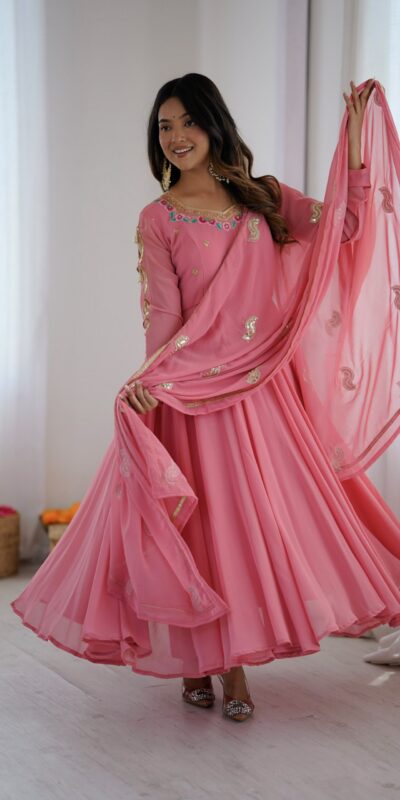 SRK 5363 Dusty Pink | Dusty Pink Faux Georgette Gown with Sequins Work & Embroidery Work. Affordable Price ₹2099. Delivery 4-6 Working Days. Shop now. | Bollywood Gowns, Creative Gowns, Designer Gowns, Embroidered Gowns, Gowns, Party Wear Gowns