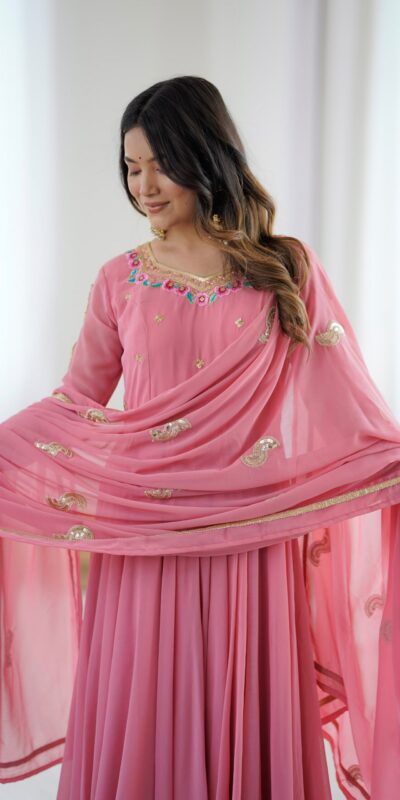 SRK 5363 Dusty Pink | Dusty Pink Faux Georgette Gown with Sequins Work & Embroidery Work. Affordable Price ₹2099. Delivery 4-6 Working Days. Shop now. | Bollywood Gowns, Creative Gowns, Designer Gowns, Embroidered Gowns, Gowns, Party Wear Gowns