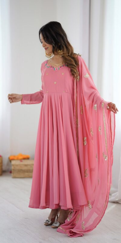 SRK 5363 Dusty Pink | Dusty Pink Faux Georgette Gown with Sequins Work & Embroidery Work. Affordable Price ₹2099. Delivery 4-6 Working Days. Shop now. | Bollywood Gowns, Creative Gowns, Designer Gowns, Embroidered Gowns, Gowns, Party Wear Gowns