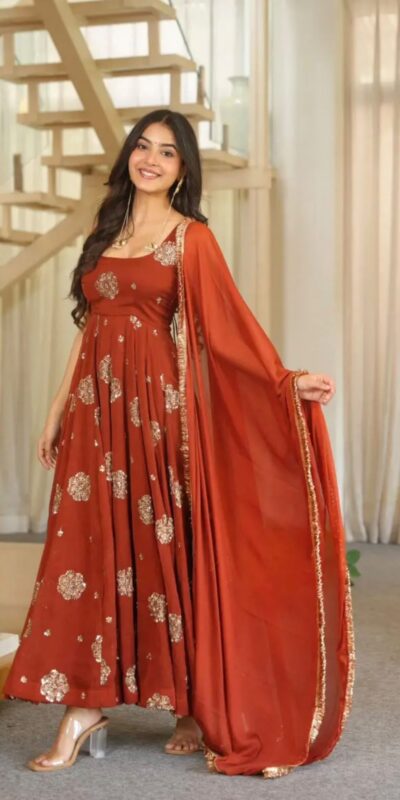ZSR 3189 Rust Doremon Crush Gown with Lace Work & Mirror Work. Exclusive Offer ₹2399. Delivery 4-6 Working Days. Shop now. | Bollywood Gowns, Creative Gowns, Designer Gowns, Embroidered Gowns, Gowns, Party Wear Gowns