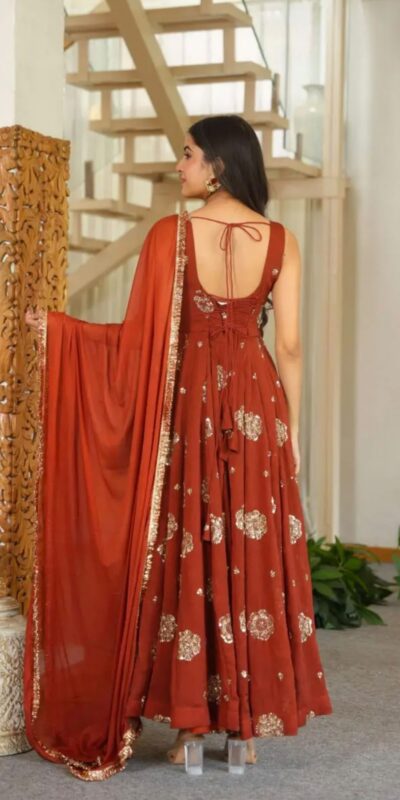ZSR 3189 Rust Doremon Crush Gown with Lace Work & Mirror Work. Exclusive Offer ₹2399. Delivery 4-6 Working Days. Shop now. | Bollywood Gowns, Creative Gowns, Designer Gowns, Embroidered Gowns, Gowns, Party Wear Gowns