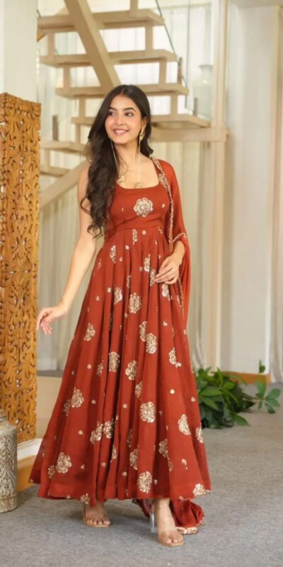 ZSR 3189 Rust Doremon Crush Gown with Lace Work & Mirror Work. Exclusive Offer ₹2399. Delivery 4-6 Working Days. Shop now. | Bollywood Gowns, Creative Gowns, Designer Gowns, Embroidered Gowns, Gowns, Party Wear Gowns