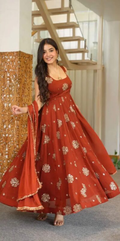 ZSR 3189 Rust Doremon Crush Gown with Lace Work & Mirror Work. Exclusive Offer ₹2399. Delivery 4-6 Working Days. Shop now. | Bollywood Gowns, Creative Gowns, Designer Gowns, Embroidered Gowns, Gowns, Party Wear Gowns