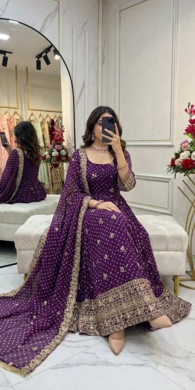 WW 1283 Wine in Colour Faux Georgette Bandhani Print Work Gown. Available at ₹2399 only. Delivery 4-6 Working Days. Shop now. | Bollywood Gowns, Creative Gowns, Designer Gowns, Embroidered Gowns, Gowns, Party Wear Gowns
