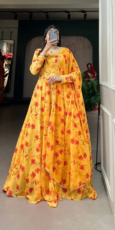 YNF 5003 Yellow Color Georgette Floral Printed Gown With Pearl Lace Border Dupatta Casual, Wedding, Party, Festive, Events Etc. 4-6 Working Days 1849/- | Bollywood Gowns, Creative Gowns, Designer Gowns, Embroidered Gowns, Gowns, Party Wear Gowns