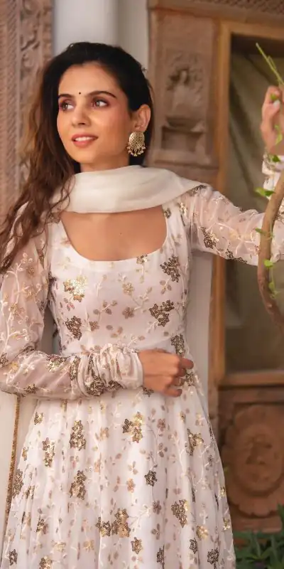 ZSR 3058 White Color Georgette Embroidery Sequence Work Gown Casual, Wedding, Party, Festive, Events Etc. Expected Delivery 4-6 Working Days 2099/- | Bollywood Gowns, Creative Gowns, Designer Gowns, Embroidered Gowns, Gowns, Party Wear Gowns