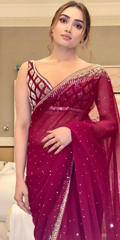 BT 3054 Maroon Saree : Georgette Work : Embroidery Sequence Work, Blouse : Banglory Silk Party Wear, Wedding Wear, Events Etc.@1749/- | Bollywood Sarees, Creative Sarees, Designer Sarees, Ethnic Saree, Modern Digital sarees, Party Wear Sarees, Sarees