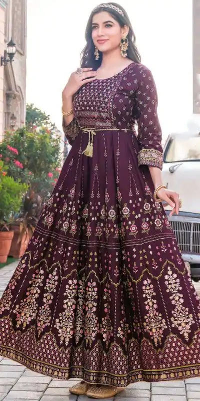  INLI Glam NX Marron Color Rayon Print Embroidery Work Long Anarkali Gown Wedding Party, Festive, Events Etc.4-6 Working Days@1699/- only | Bollywood Gowns, Creative Gowns, Designer Gowns, Embroidered Gowns, Gowns, Party Wear Gowns, Straight Suits