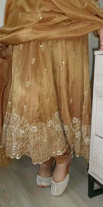 ZF 412 Gold Color Barbari Silk With Embroidery Work Gown Casual, Wedding, Party, Festive, Events Etc.4-6 Working Days@ 2149/-only | Bollywood Gowns, Creative Gowns, Designer Gowns, Embroidered Gowns, Gowns, Party Wear Gowns