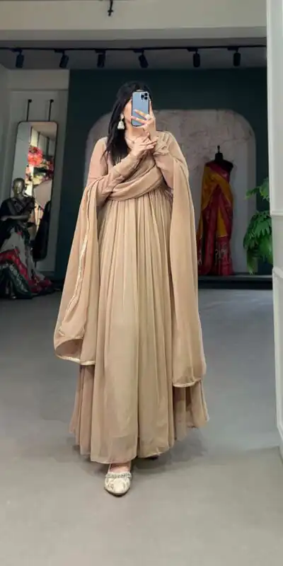 YNF 5102 Chiku Color Georgette Plain Sequins Embroidery Lace Gown Casual, Wedding, Festive, Events . Expected Delivery 4-6 Working Days @1749/- only | Bollywood Gowns, Creative Gowns, Designer Gowns, Embroidered Gowns, Gowns, Party Wear Gowns