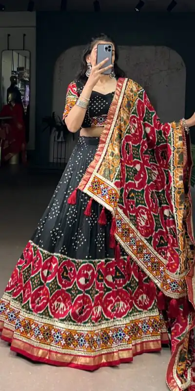 LNB 1734 Black Tasar Silk Gamthi Work With MirrorWork Lehenga Choli Introductory Price ₹2999. Delivery 4-6 Working Days. Shop now. | Creative Lehenga, Bollywood Lehenga, Designer Lehenga, Embroidered Lehenga, Lehenga, Party Wear Lehenga
