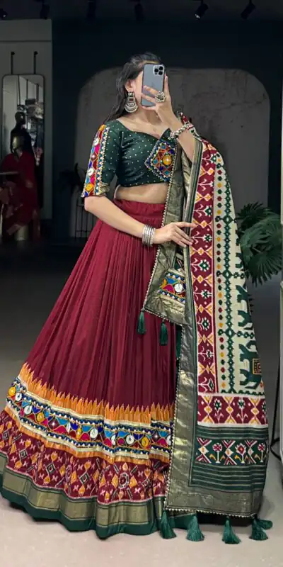 LNB 1727 Maroon Tasar Silk With Gamthi Work & Mirror Work. Get it for Lehenga Choli ₹2999. Delivery 4-6 Working Days. Shop now. | Creative Lehenga, Bollywood Lehenga, Designer Lehenga, Embroidered Lehenga, Lehenga, Party Wear Lehenga
