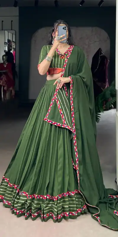 LNB 1659 Mehendi Color Pure Rayon With Mirror Work & Gamthi Work. Lehenga Choli Price ₹4199.Introductory Delivery 4-6 Working Days. Shop now. | Creative Lehenga, Bollywood Lehenga, Designer Lehenga, Embroidered Lehenga, Lehenga, Party Wear Lehenga