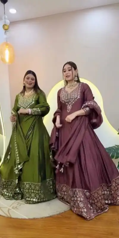 NSR 872 Onion Roman Simmer Silk With Fency Neck And Fecny Sleeve Gown with Embroidery Work & Lace Work. Available at ₹2449 only. Delivery 4-6 Wor | Bollywood Gowns, Creative Gowns, Designer Gowns, Embroidered Gowns, Gowns, Party Wear Gowns