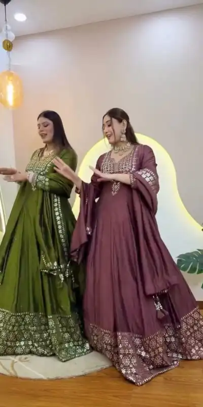 NSR 872 Onion Roman Simmer Silk With Fency Neck And Fecny Sleeve Gown with Embroidery Work & Lace Work. Available at ₹2449 only. Delivery 4-6 Wor | Bollywood Gowns, Creative Gowns, Designer Gowns, Embroidered Gowns, Gowns, Party Wear Gowns