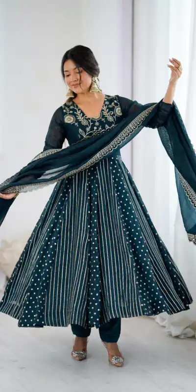 SRK 5293 Peacock Blue With Crunchy Silk With Fully Flair with Lace Work & Embroidery Work Anarkali Gown . Introductory Price ₹2149. Delivery 4-6 Worki | Bollywood Gowns, Creative Gowns, Designer Gowns, Embroidered Gowns, Gowns, Party Wear Gowns