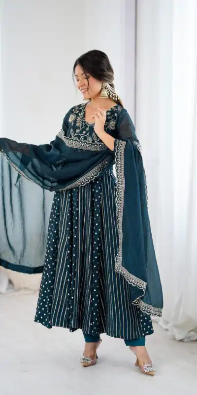 SRK 5293 Peacock Blue With Crunchy Silk With Fully Flair with Lace Work & Embroidery Work Anarkali Gown . Introductory Price ₹2149. Delivery 4-6 Worki | Bollywood Gowns, Creative Gowns, Designer Gowns, Embroidered Gowns, Gowns, Party Wear Gowns