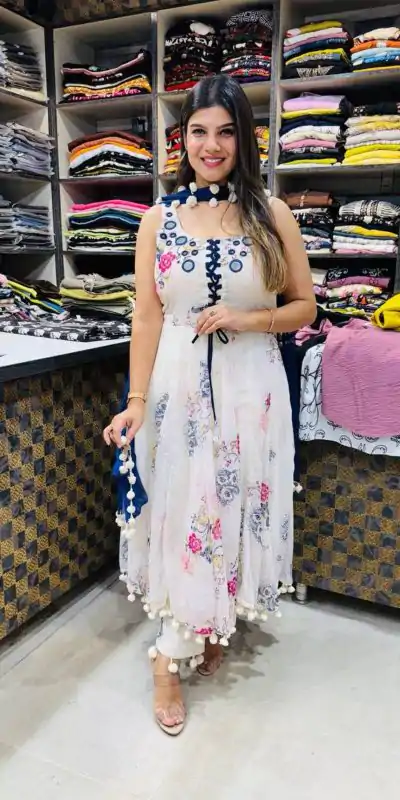 ZSR 3147 White Georgette Butti With Digital Print And Mirror Work Perfect for Wedding, Party, Engagement, Holi, Cultural Events 2099/- only | Bollywood Gowns, Creative Gowns, Designer Gowns, Embroidered Gowns, Gowns, Party Wear Gowns