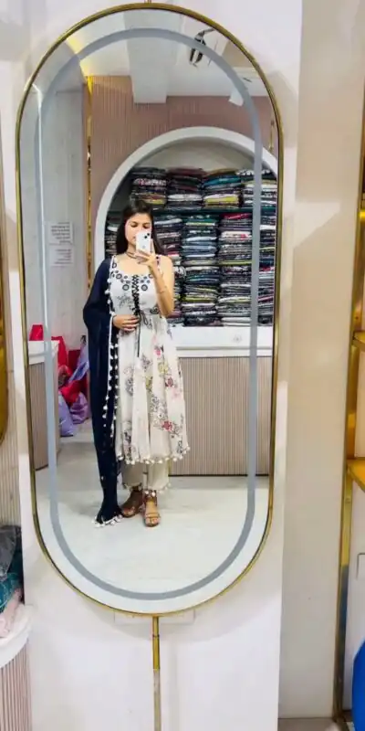 ZSR 3147 White Georgette Butti With Digital Print And Mirror Work Perfect for Wedding, Party, Engagement, Holi, Cultural Events 2099/- only | Bollywood Gowns, Creative Gowns, Designer Gowns, Embroidered Gowns, Gowns, Party Wear Gowns