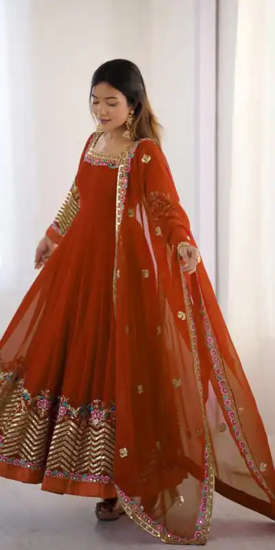 ZF 5010 Rust Georgette Gown Perfect for Wedding, Party, Pooja, Ethnic Day, Karwa Chauth – . Best Price ₹2049. Delivery 4-6 Working Days. Shop now. | Casual Suits, Jump Suits, Creative suits, Designer Suits, Palazzo Suits, Party Wear Suits, Patiala Suits, Salwar suit, Straight Suits