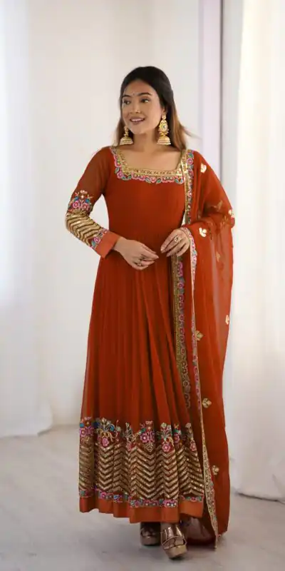 ZF 5010 Rust Georgette Gown Perfect for Wedding, Party, Pooja, Ethnic Day, Karwa Chauth – . Best Price ₹2049. Delivery 4-6 Working Days. Shop now. | Casual Suits, Jump Suits, Creative suits, Designer Suits, Palazzo Suits, Party Wear Suits, Patiala Suits, Salwar suit, Straight Suits