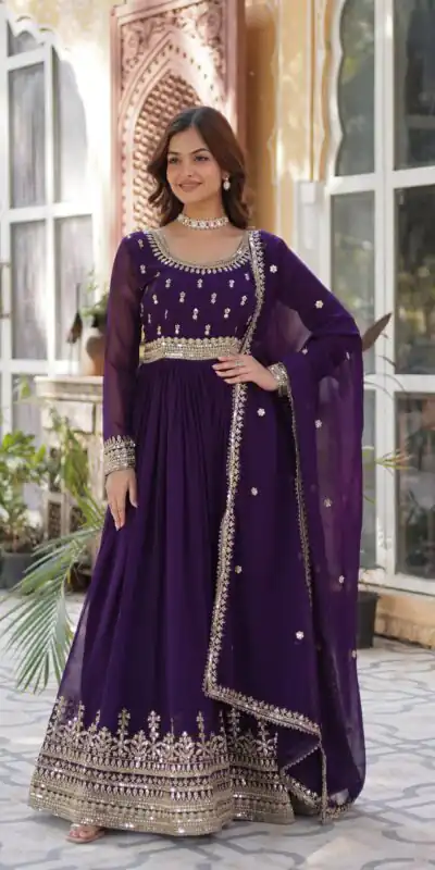 KA 1144 Dark Purple Faux Blooming Gown with Embroidery Work & Zari Work. Exclusive Offer ₹2449. Delivery 4-6 Working Days. Shop now. | Bollywood Gowns, Creative Gowns, Designer Gowns, Embroidered Gowns, Gowns, Party Wear Gowns