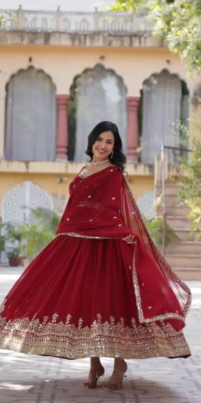 KA 1144 Maroon Faux Blooming Gown with Embroidery Work & Zari Work. Exclusive Offer ₹2449. Delivery 4-6 Working Days. Shop now. | Bollywood Gowns, Creative Gowns, Designer Gowns, Embroidered Gowns, Gowns, Party Wear Gowns